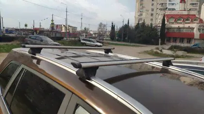 Багажник на интегрированные рейлинги INTER Integra для Lada Vesta Cross универсал (SW) 2018-2024 (Крыловидные дуги). Артикул 5517+1205-0